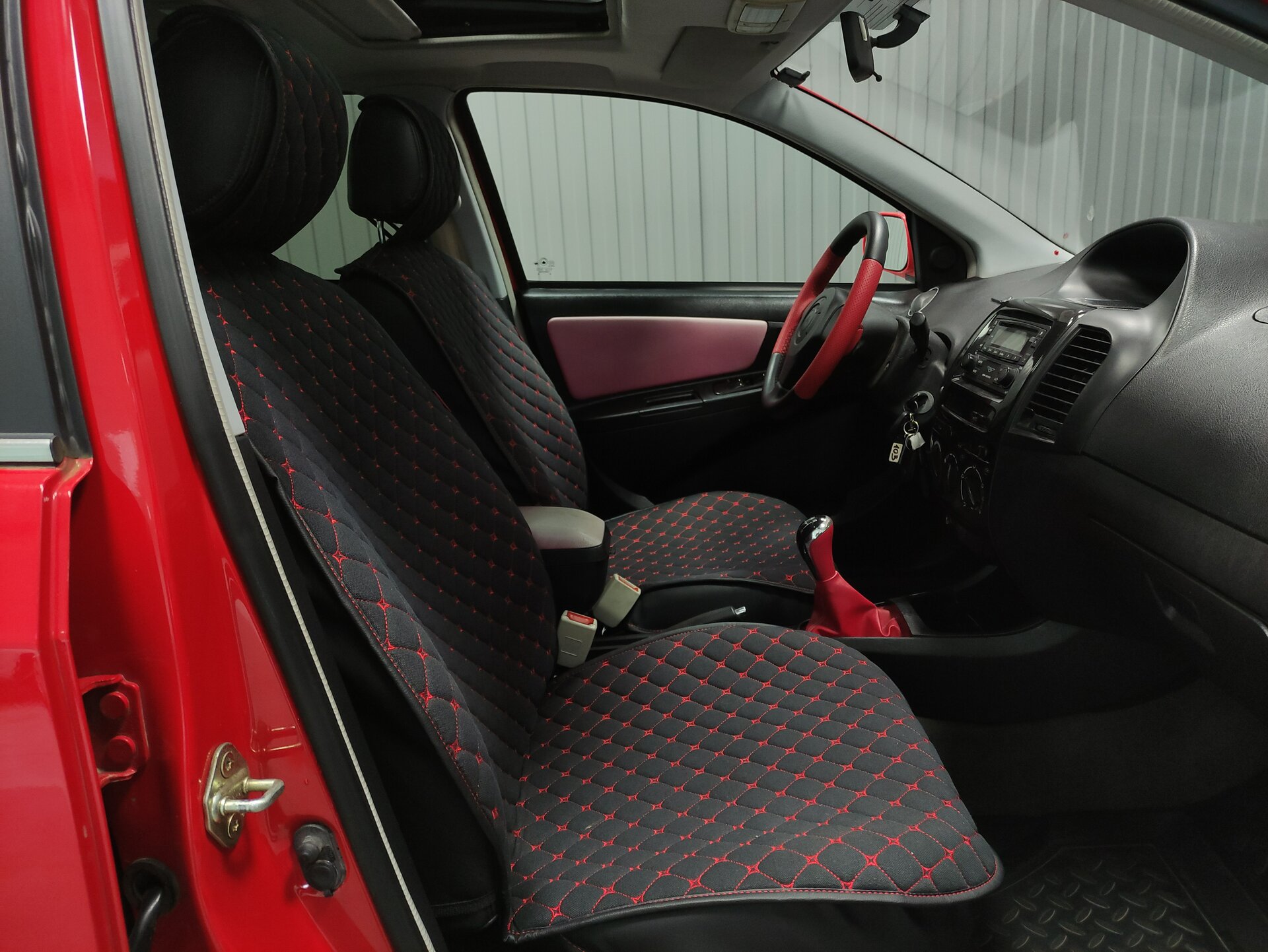 Geely MK Cross, I 2012